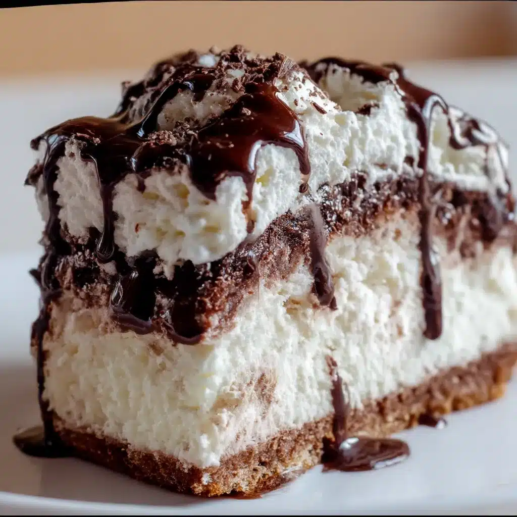 No-bake hot fudge ice cream cake slice with Oreo crust and whipped cream topping