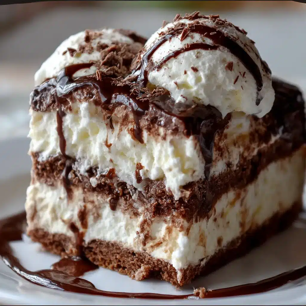 No-bake hot fudge ice cream cake slice with Oreo crust and whipped cream topping