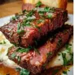 Beef Manhattan open-faced sandwich topped with rich gravy and served with mashed potatoes