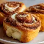 Cinnamon Sugar Cream Cheese Rolls fresh from the oven with vanilla glaze.