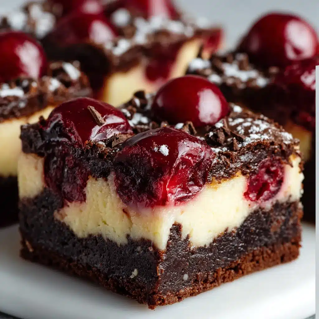 Cherry cheesecake brownies with chocolate base, creamy cheesecake layer, and bright cherry swirl on top.