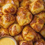 Easy Biscuit Pretzel Bites with Cheese Sauce
